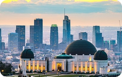 Los Angeles skyline with Griffith Observatory at sunset